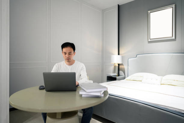 istock A young business man works from home using a laptop for online meetings. 1387628003