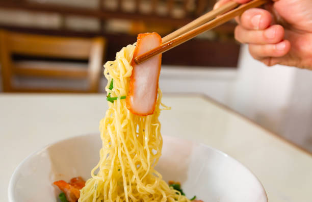Chinese style red pork noodles, soft focus photo