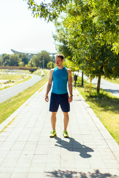 istock Man prepare to running on a track in a sunny day 1387630847