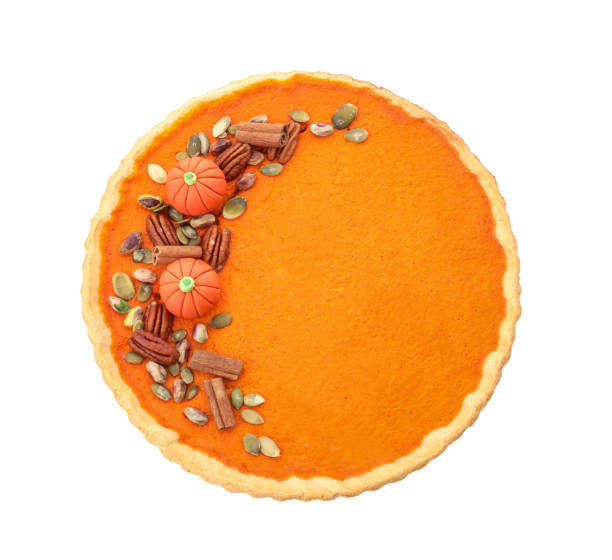 istock Delicious homemade pumpkin pie isolated on white, top view 1387630883