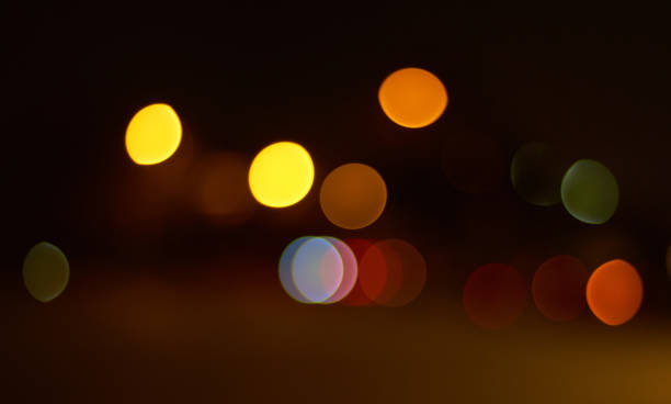 istock Dreamy light spots in the city at night 1387637469