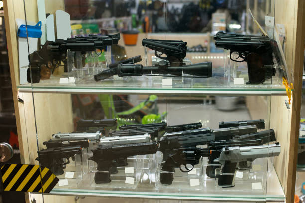 Showcase with traumatic weapons in the store