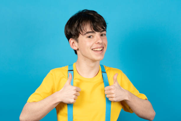 istock Teenager with thumbs up 1387643556