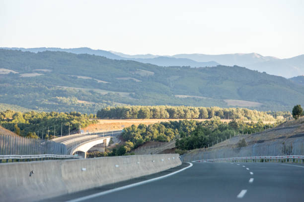 istock greece speed way beautiful landscape mountains in background 1387647694