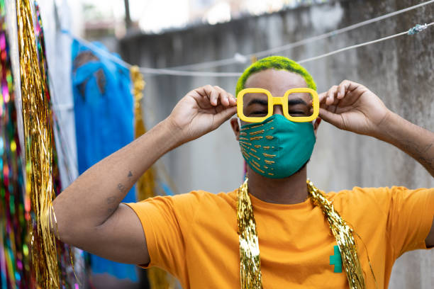 istock Masked man playing brazilian Carnaval 1387647992