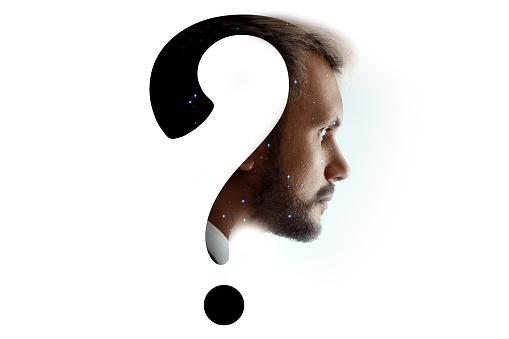 question mark in a man's head isolated on white background. Innovation and education concept. Midlife crisis, questions about the future, philosophy