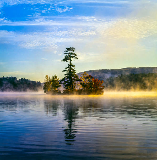 istock Fog on Maine lake, sunrise 1387652157