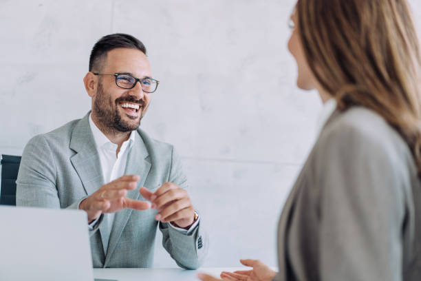 business partners in meeting. - women men signing business imagens e fotografias de stock