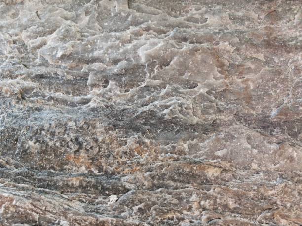 istock Seamless pattern. Beautiful stone background, texture of mountain cliff 1387652407