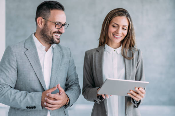 istock Business conversation in the office. 1387652423