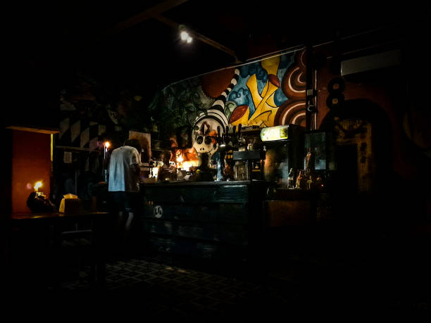 MONTEVIDEO, URUGUAY, FEBRUARY - 2022 - High contrast night scene at vintage style bar, Montevideo, Uruguay