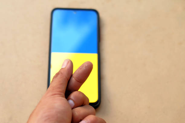 istock Male hand gesturing against Ukraine flag 1387656929