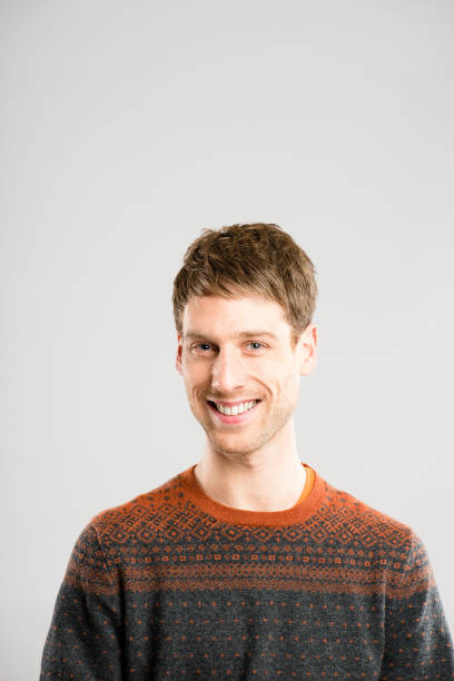 istock Shot of a handsome young man standing alone in the studio and posing 1387657936