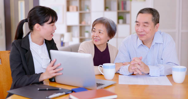 istock asian elderly couple buy house 1387660655