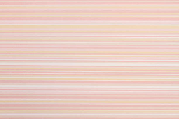 istock White, pink and beige striped background 1387661118
