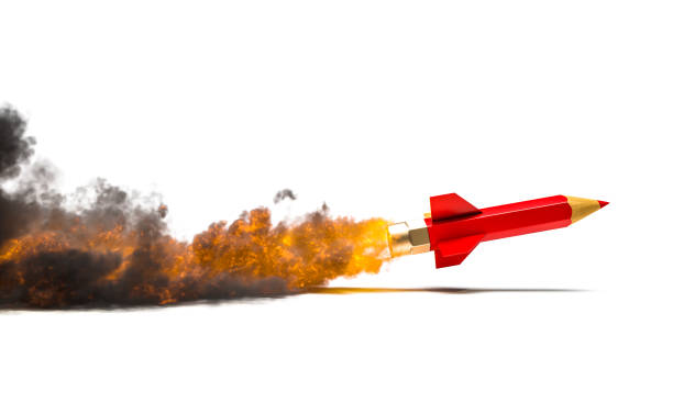 istock pencil in the shape of a rocket that takes flight. 1387662280