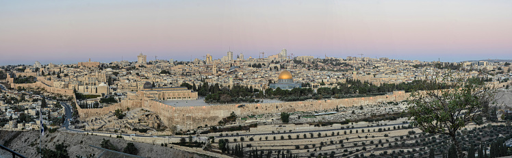 Dawn on the Temple Mount. Panorama of the Old City in Jerusalem in the early morning from the Mount of Olives.