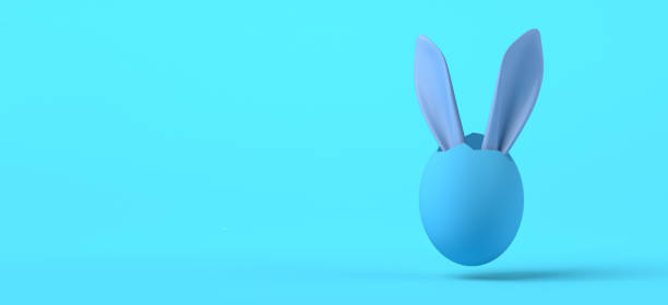 istock Easter bunny ears coming out of an easter egg. 3D illustration. Copy space. 1387665641