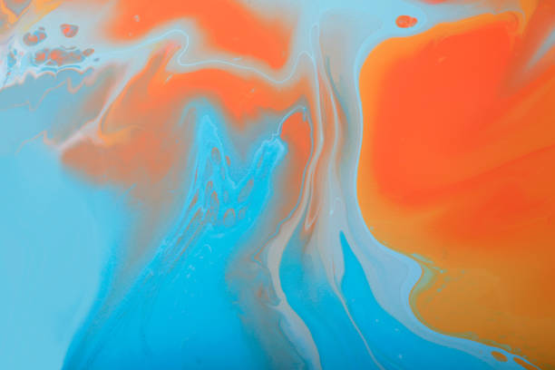 istock Pastel marble background with abstract stains.Mixed liquid nail polishes.Modern make up backdrop.Fluid art technique.Copy space.Pour painting art work.Macro photography.Horizontal banner. 1387666514