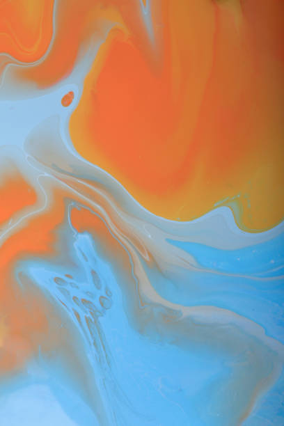 istock Pastel marble background with abstract stains.Mixed liquid nail polishes.Modern make up backdrop.Fluid art technique.Copy space.Pour painting art work.Macro photography.Vertical banner. 1387666600