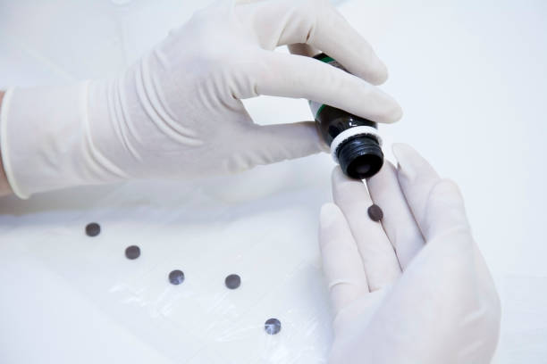 istock Nurse separating medicine in hospital 1387670705