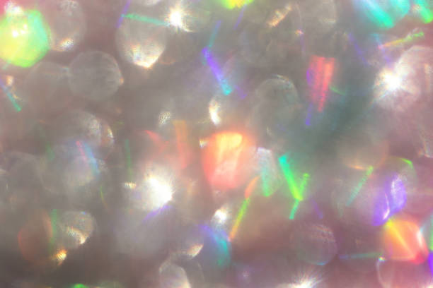 istock Abstract defocused silver background with shining glitter.Good as overlay layer.Abstract defocused background with shining glitter. 1387671141