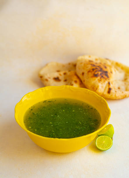 istock Egyptian Molokhia soup with pita bread 1387672531