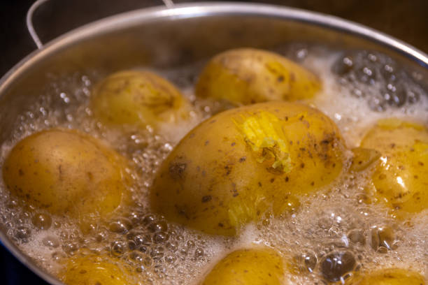 istock potatoes that cook in a saucepan 1387673108