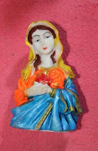 istock mother merry statue with pink colour background. 1387674894