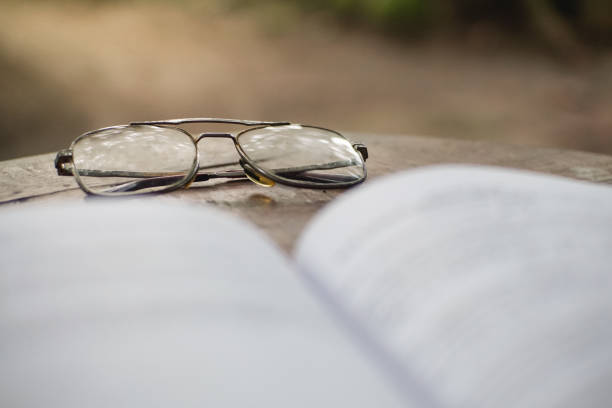 istock Glasses and books 1387677817