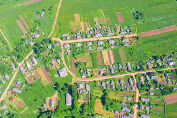 istock Village and countryside in summertime, view from above. 1387679425