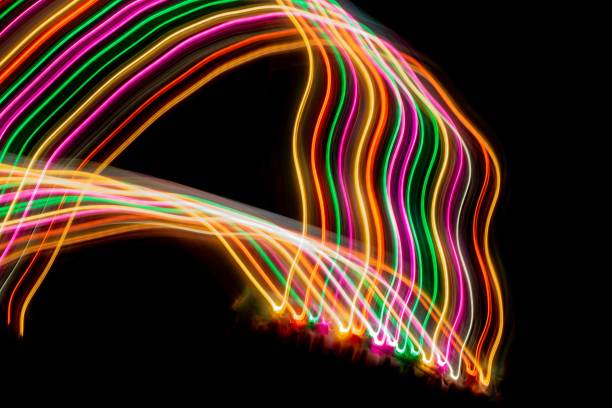 istock colorful luminous lines on a black background 1387679470