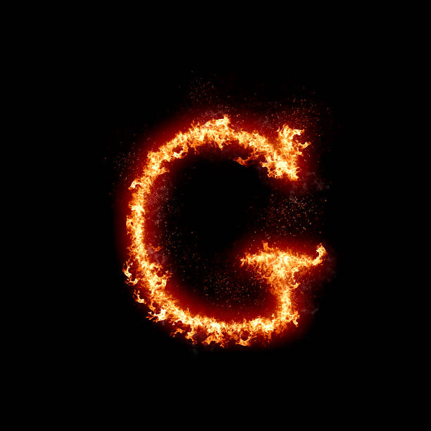 istock Letter G burning in fire, digital art isolated on black background, a letter from alphabet set 1387679611