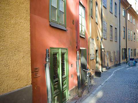 coloured building facades in a street in the Gamla Stan area of Stockholm Sweden