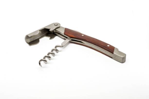 istock Corkscrew, Bottle opener with cork on white isolated background 1387681813