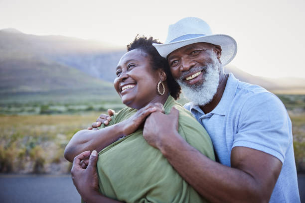 istock Affectionate mature couple enjoying the scenery during a day out in nature 1387682730