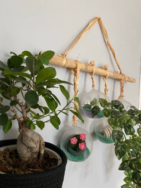 istock Small Bonsai with fake plants 1387686068