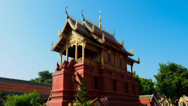 istock Hor Dhama or Hall of Buddhist scripture tower at Wat Phra That Haripunchai, Lamphun, Thailand. 1387688880
