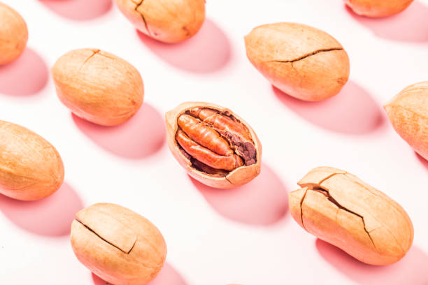 istock Delicious snacks - a pile of Pecan 1387689179