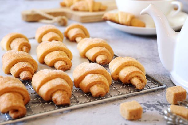 istock Cottage cheese croissants and cup of tea 1387697498