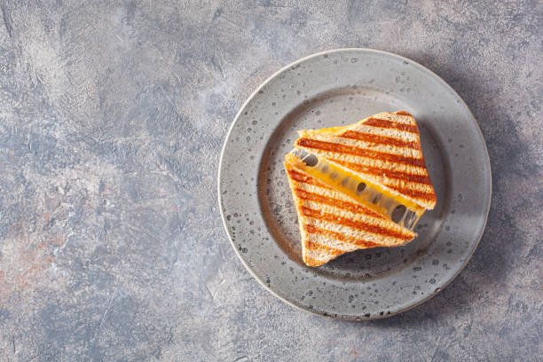 istock grilled cheese sandwich on gray concrete background 1387697603