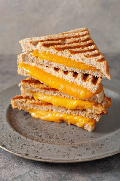 istock grilled cheese sandwich on gray concrete background 1387697609