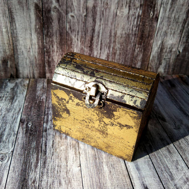 istock small decorative jewelry chest on wooden background 1387697708