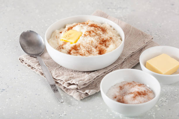 istock rice pudding with butter cinnamon. french riz au lait, norwegian risgrot, traditional breakfast dessert 1387698372