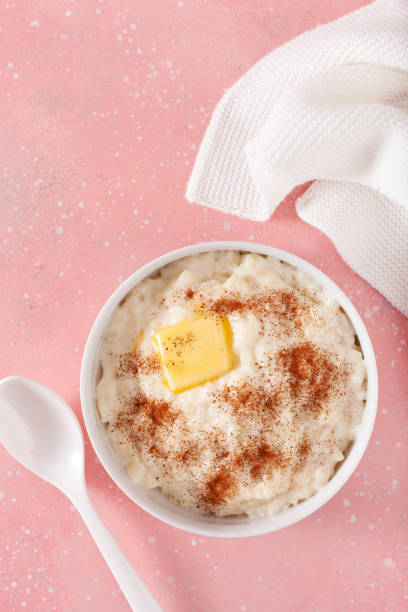 istock rice pudding with butter cinnamon. french riz au lait, norwegian risgrot, traditional breakfast dessert 1387698449