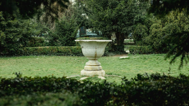 istock Decorative stone vessel in the park 1387698616