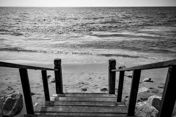 istock Sea and railed footpath to the beach 1387700421