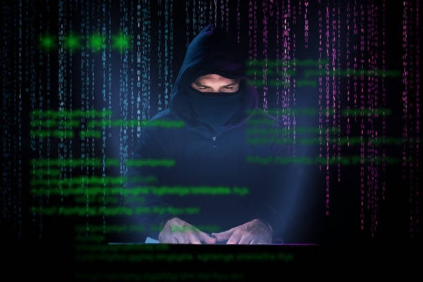 istock Hacker trying to crack passwords and breach internet security. Phishing alarm 1387702660