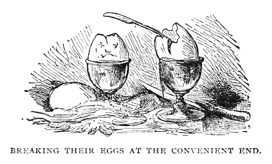 Anthropomorphic face on one of two boiled eggs in eggcups. The other egg is cracked with a knife and spoon. Gulliver  Illustration 19 of 50.
Illustration published in a 1899 edition of Jonathan Swift's novel Gulliver's Travels. Copyright has expired and is in Public Domain.
