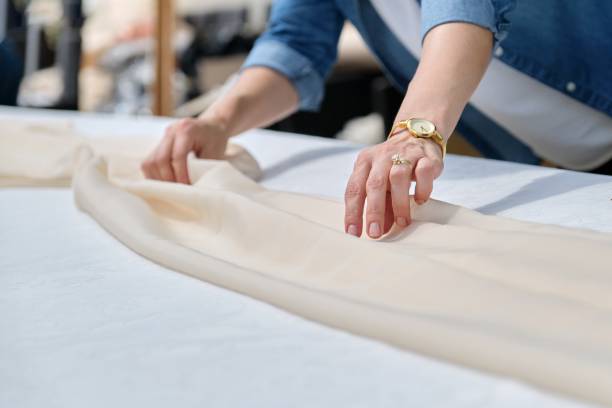 istock Woman making holiday decor with tablecloth on table 1387704293